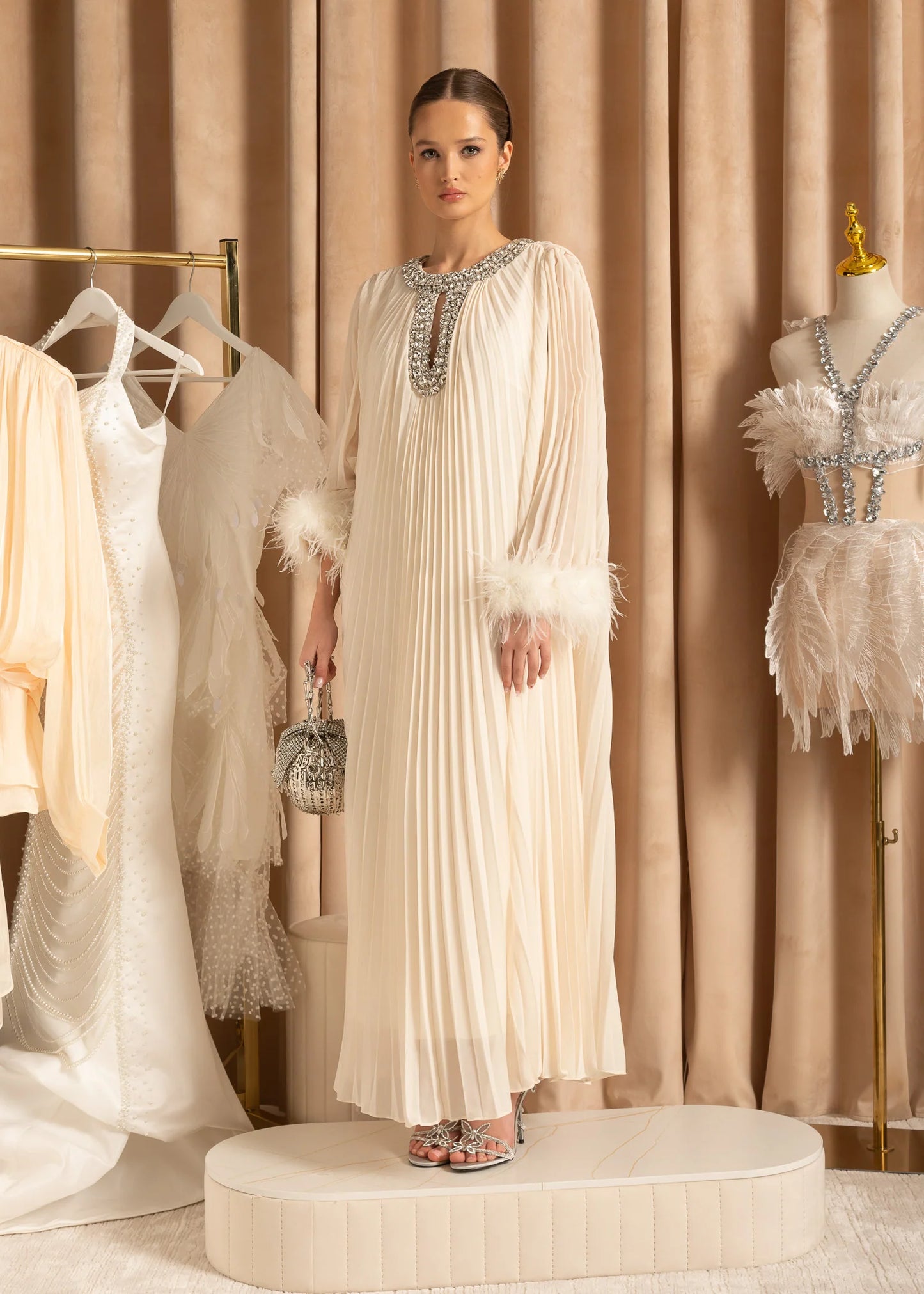 Elegant Ribbed Dress With Fluffy Cuffs And Sparkling Neckline Adornments - Ivoire