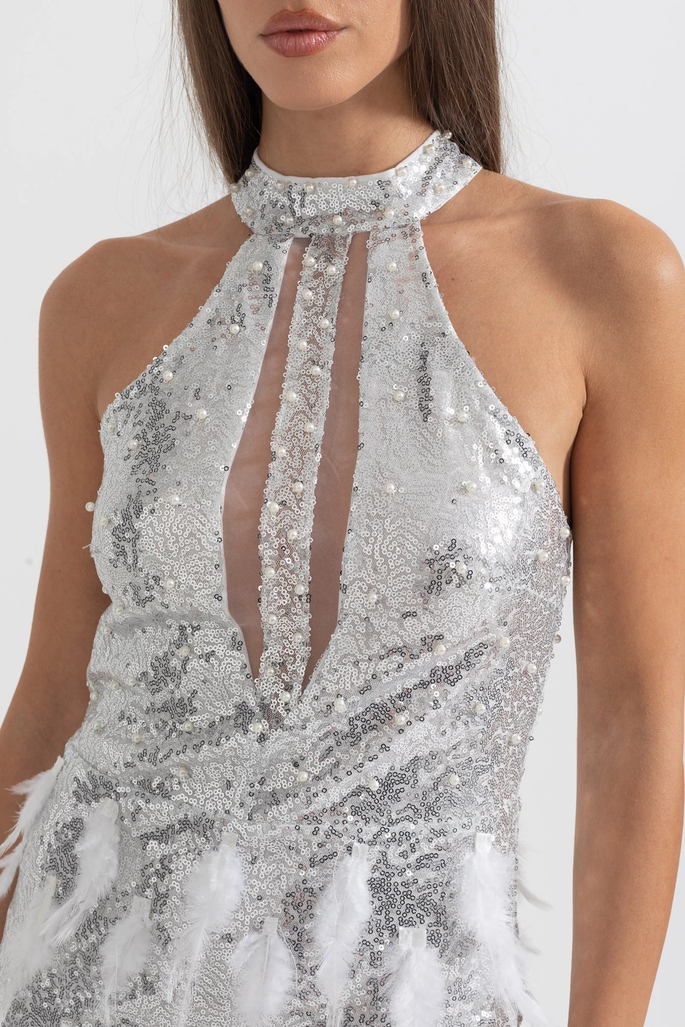 Sparkling Sequin Mini Dress With Front Sheer Cutouts And Feather Embellishments - Silver