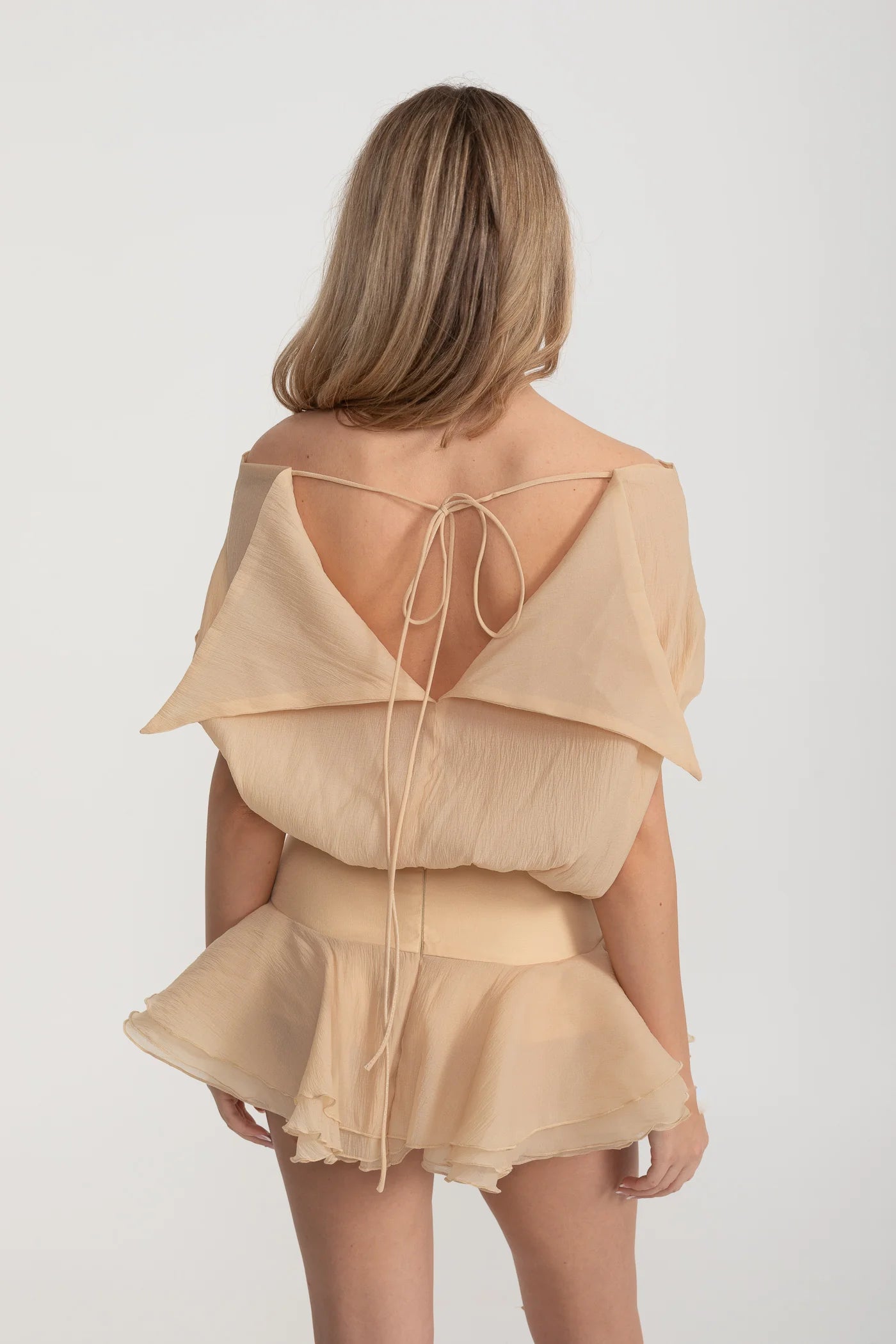 Off-Shoulder Ruffled Romper with Rosette Waist Detail - Beige