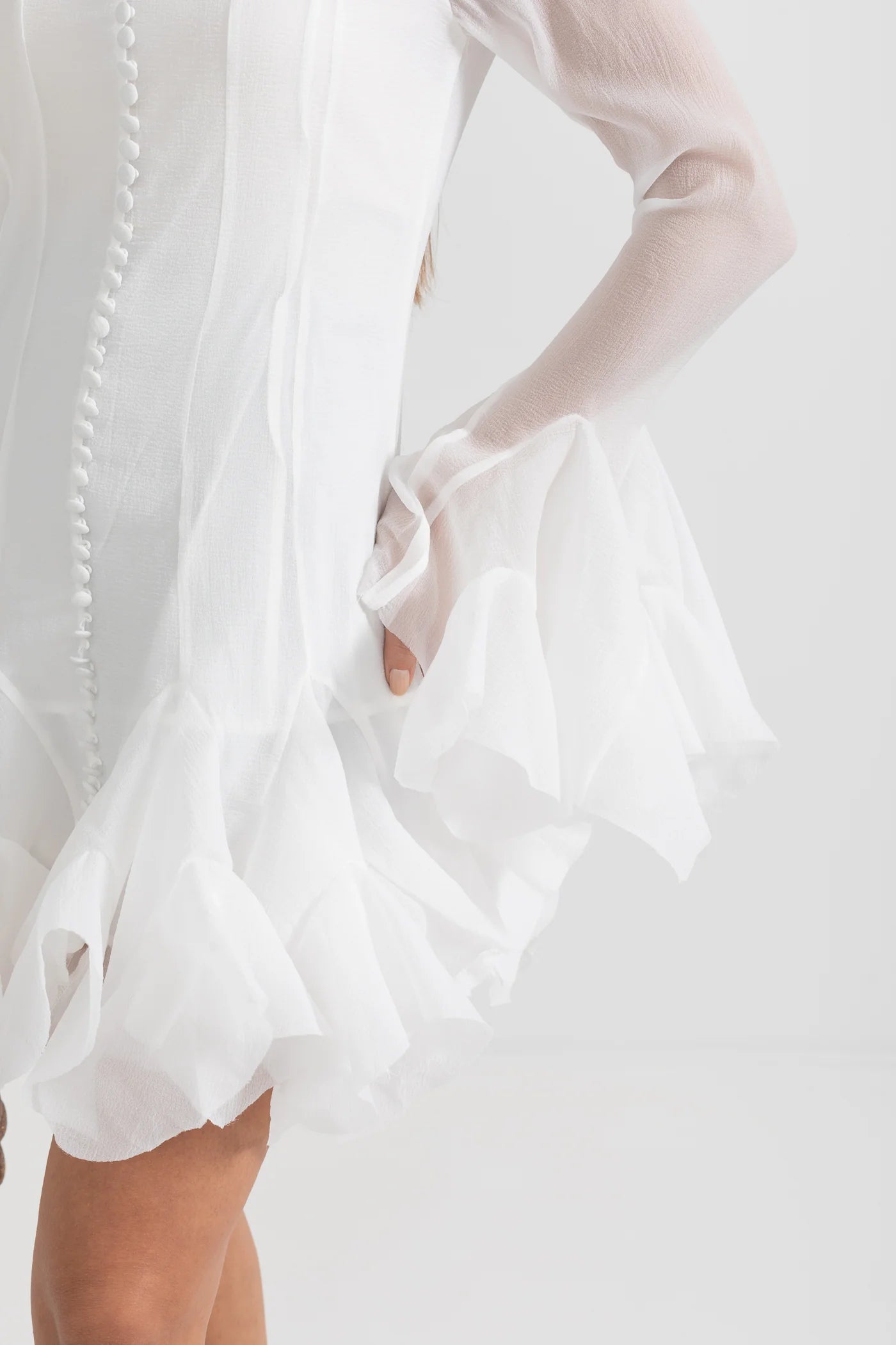 Chic Mini Dress With See-Through Sleeves And Flared Hemline - White