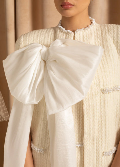 Elegant Textured Overcoat With White Bow Detail - Ivoire